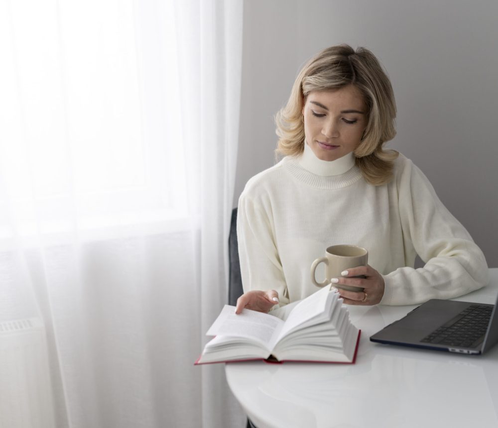 close-up-woman-reading-home